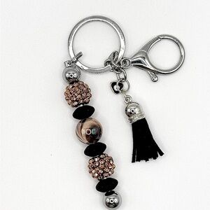 Elegant Black and Silver Keychain with Tassel